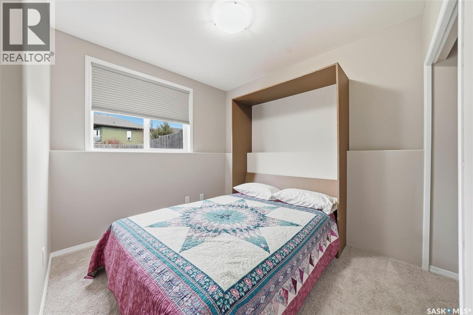 517 Redwood Crescent, Warman, SK - Indoor Photo Showing Bedroom