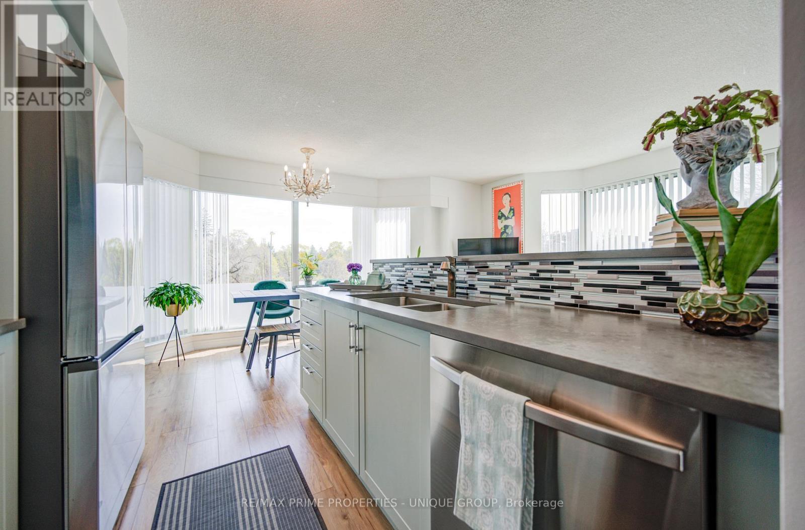 202 - 97 Lawton Boulevard, Toronto, ON - Indoor Photo Showing Kitchen With Double Sink