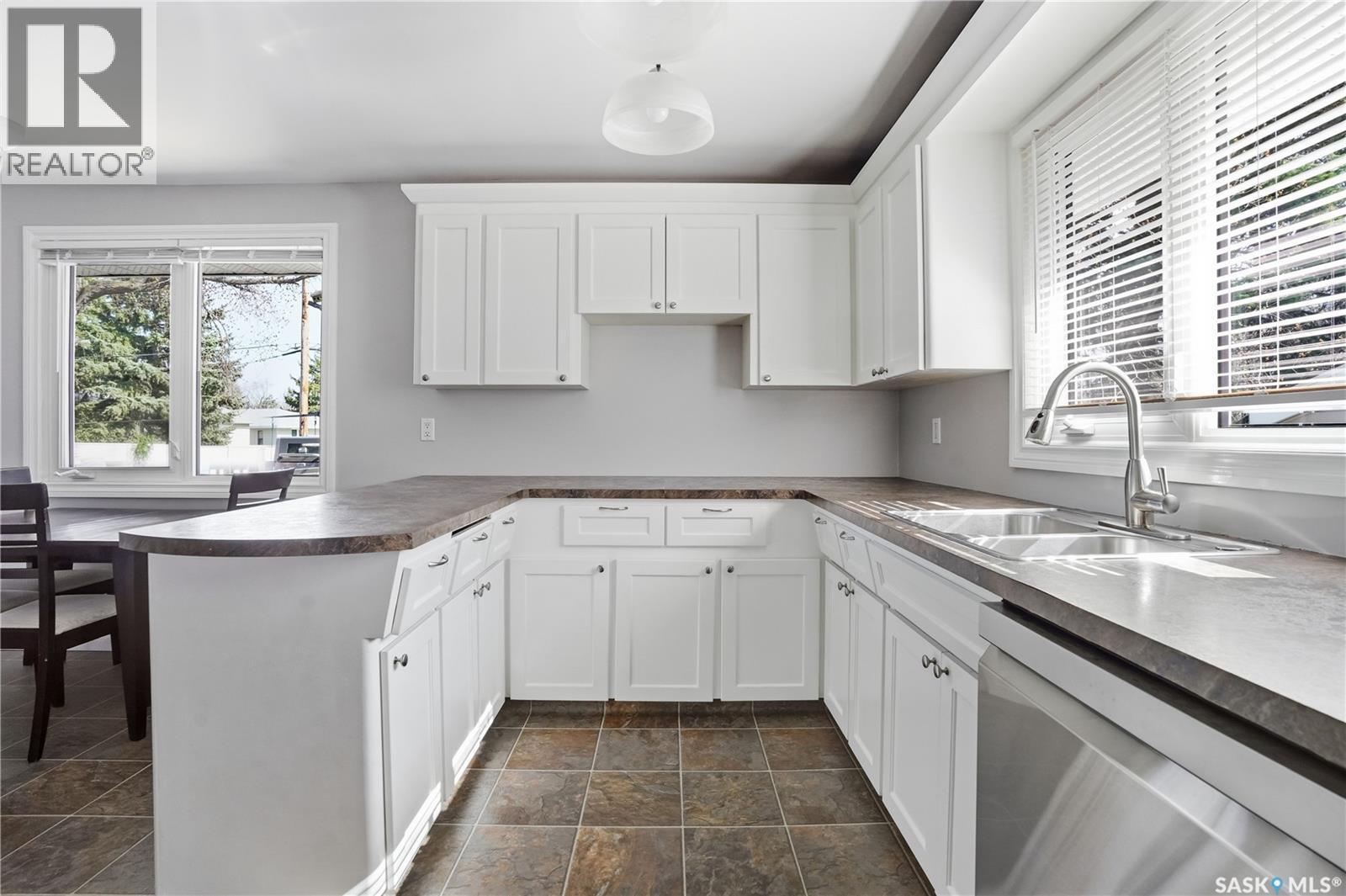 115 Stapleford Crescent, Regina, SK - Indoor Photo Showing Kitchen With Double Sink