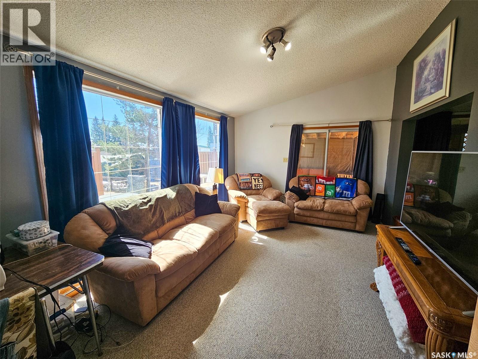 208 Wall Ridge Trail, Lac Pelletier, SK - Indoor Photo Showing Living Room