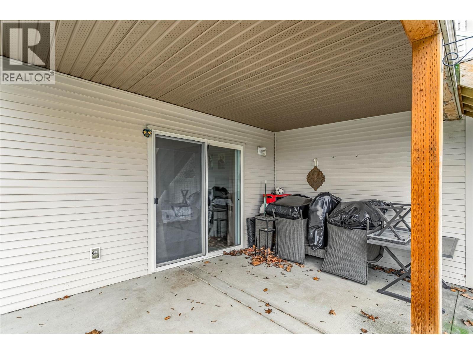 Lower covered Patio - 3819 Glen Canyon Drive, West Kelowna, BC - Outdoor With Deck Patio Veranda With Exterior