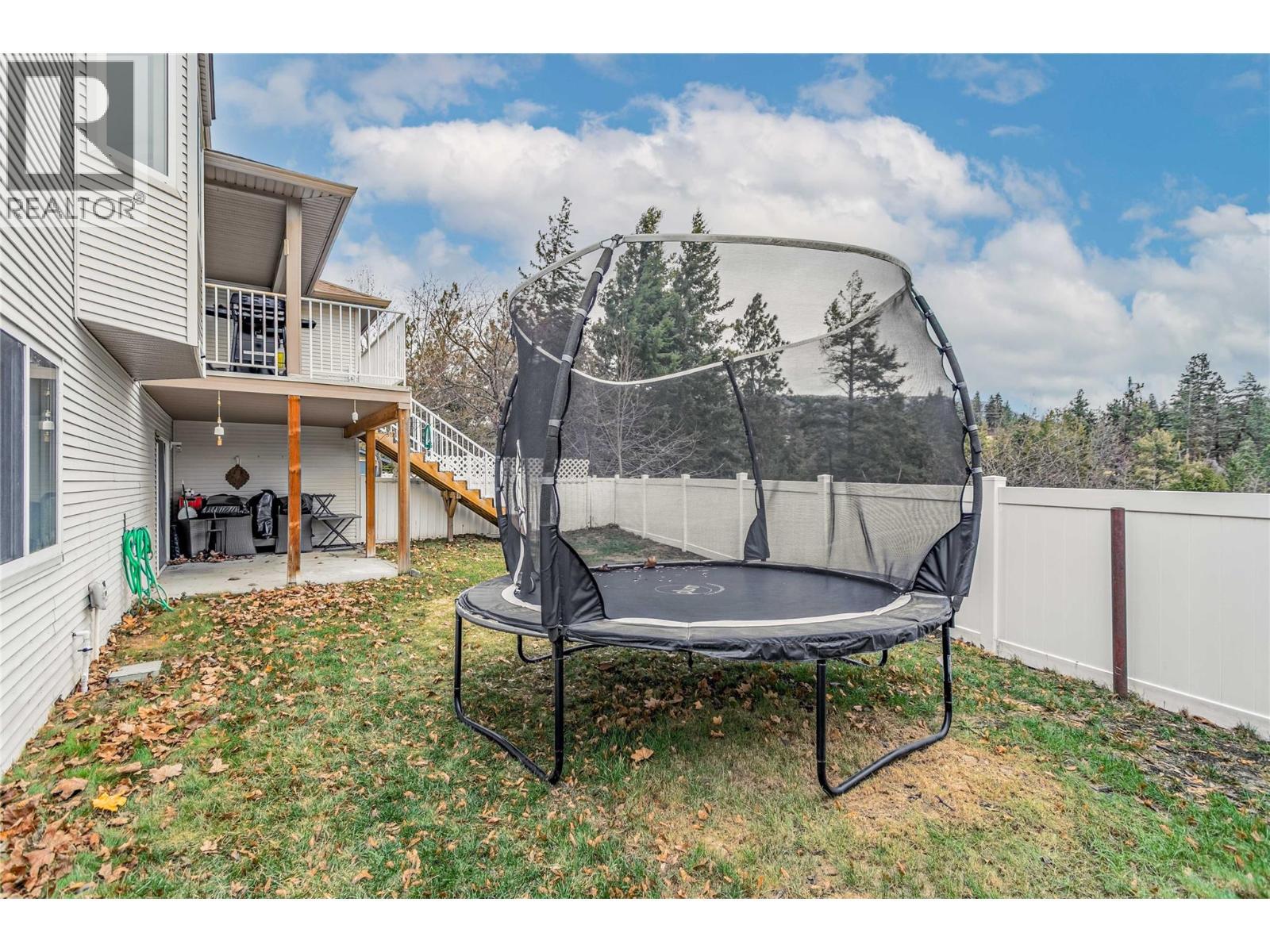 Large, fully fenced yard - 3819 Glen Canyon Drive, West Kelowna, BC - Outdoor With Deck Patio Veranda