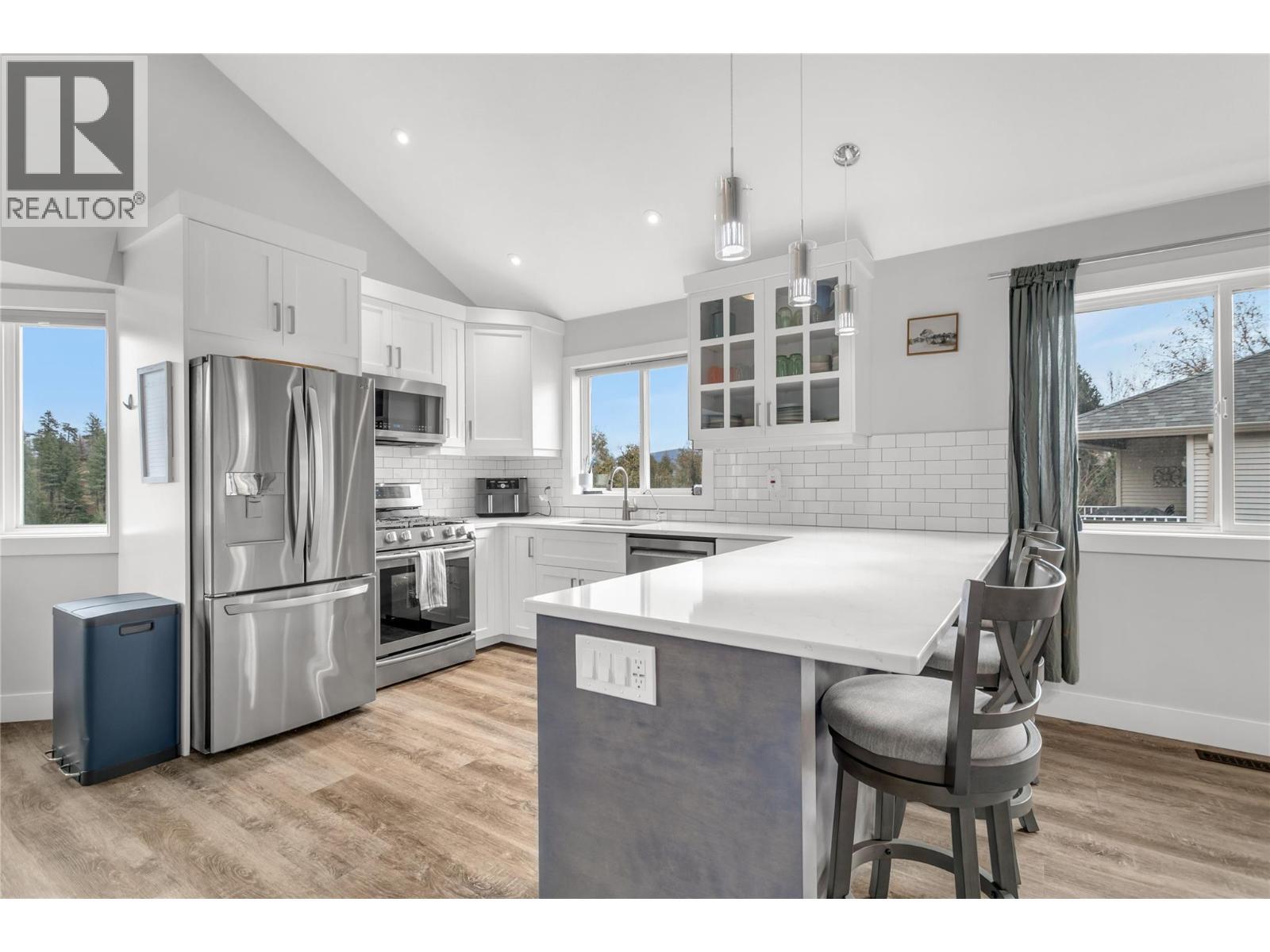Stone counters - 3819 Glen Canyon Drive, West Kelowna, BC - Indoor Photo Showing Kitchen With Upgraded Kitchen