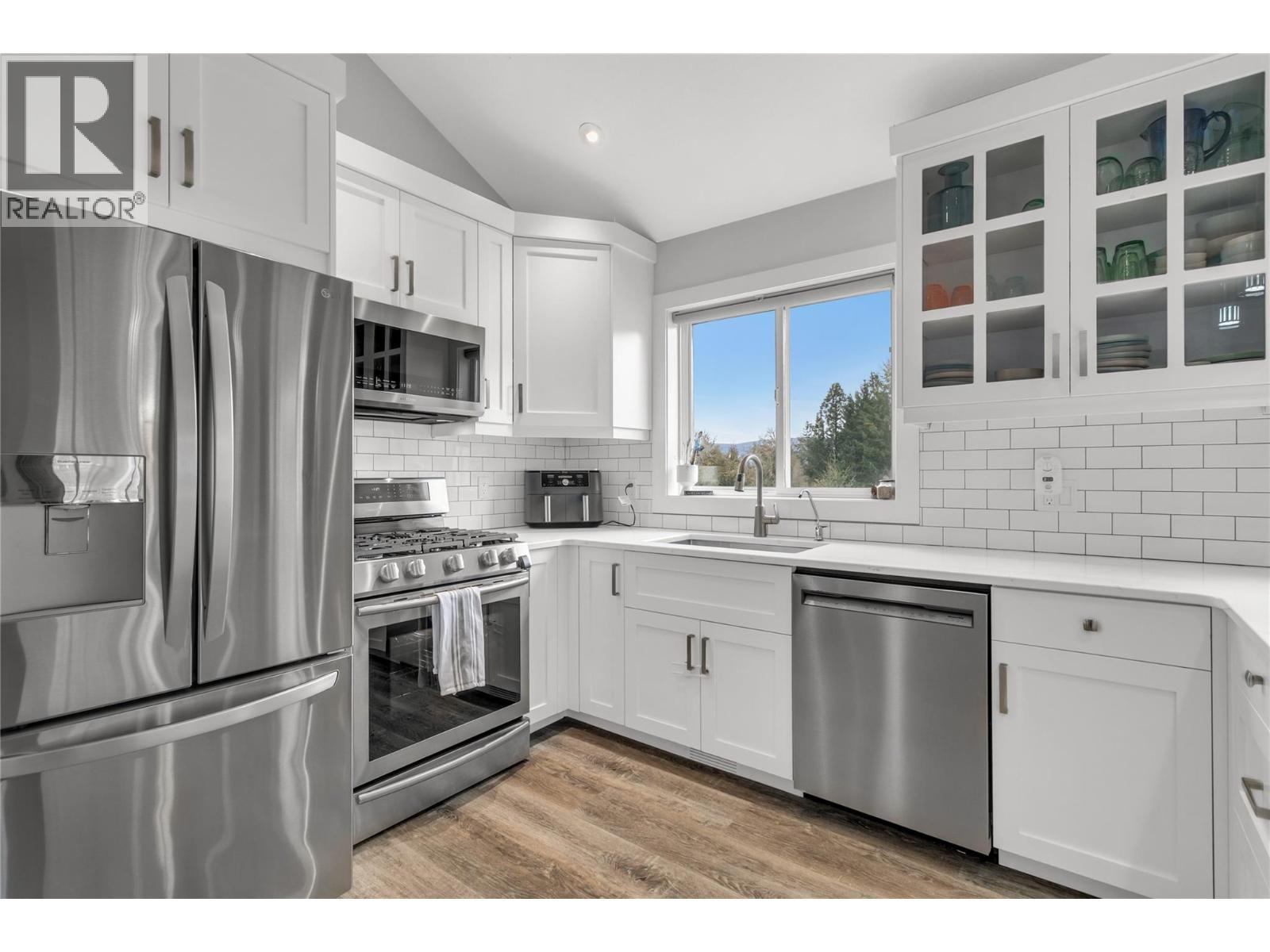 Stainless appliances - 3819 Glen Canyon Drive, West Kelowna, BC - Indoor Photo Showing Kitchen With Upgraded Kitchen