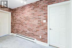 Entrance to both main floor bedrooms with ensuite baths. -