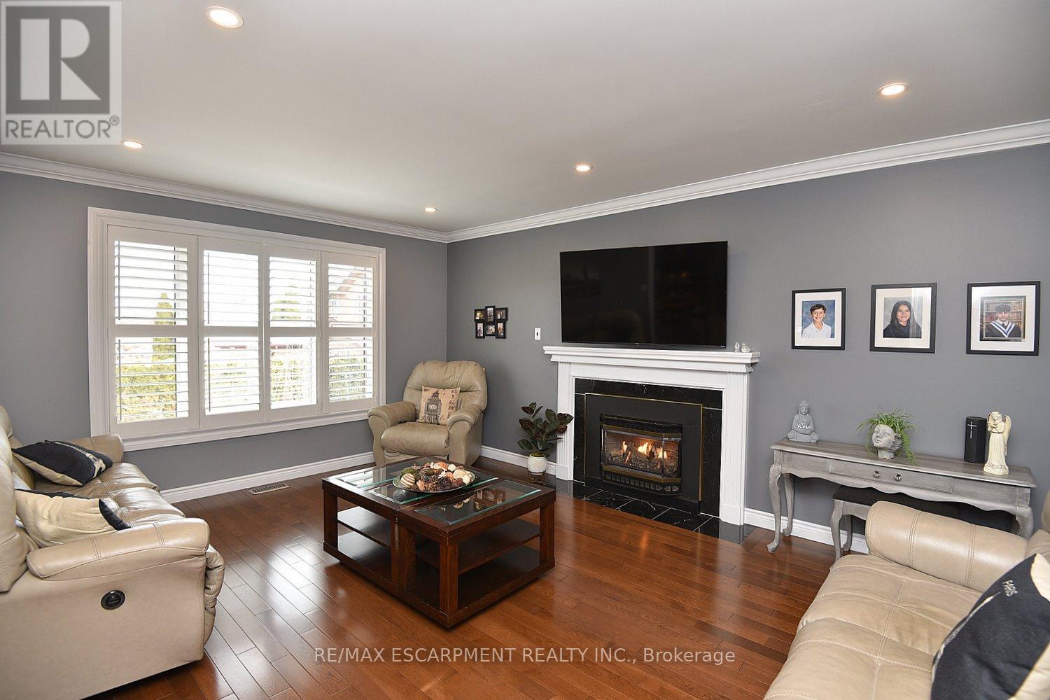 36 Tommar Place, Hamilton, ON - Indoor Photo Showing Living Room With Fireplace
