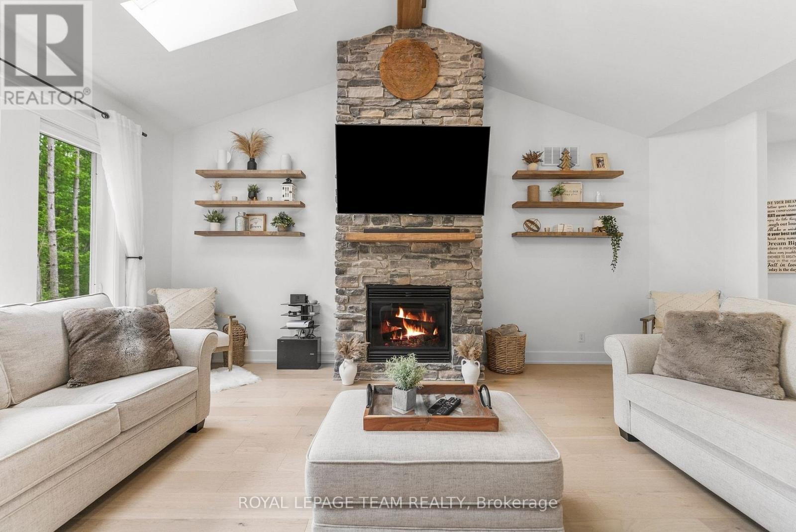 108 Royal Troon Lane, Ottawa, ON - Indoor Photo Showing Living Room With Fireplace