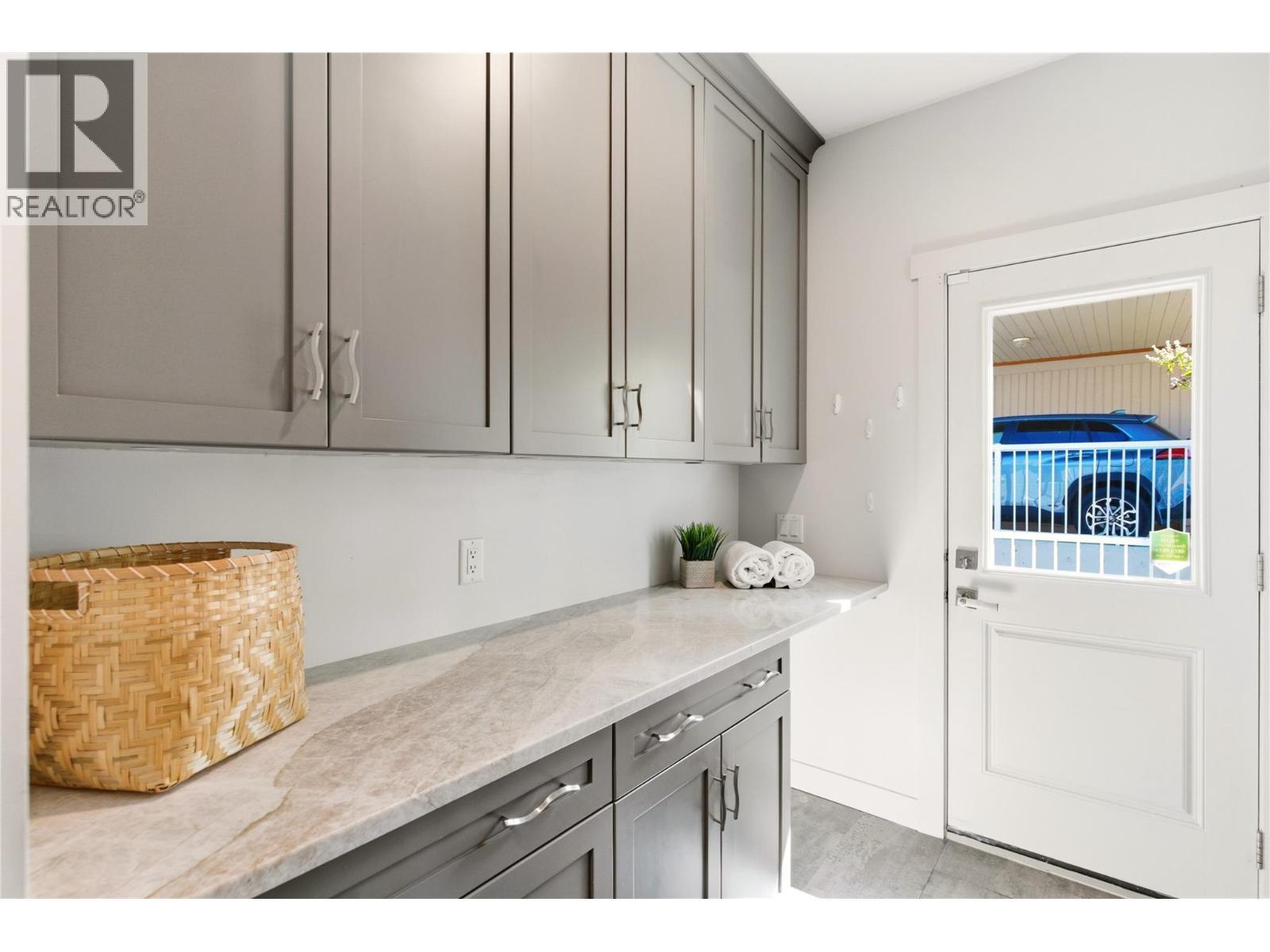 Main floor laundry - 2090 Bennett Road, Kelowna, BC - Indoor