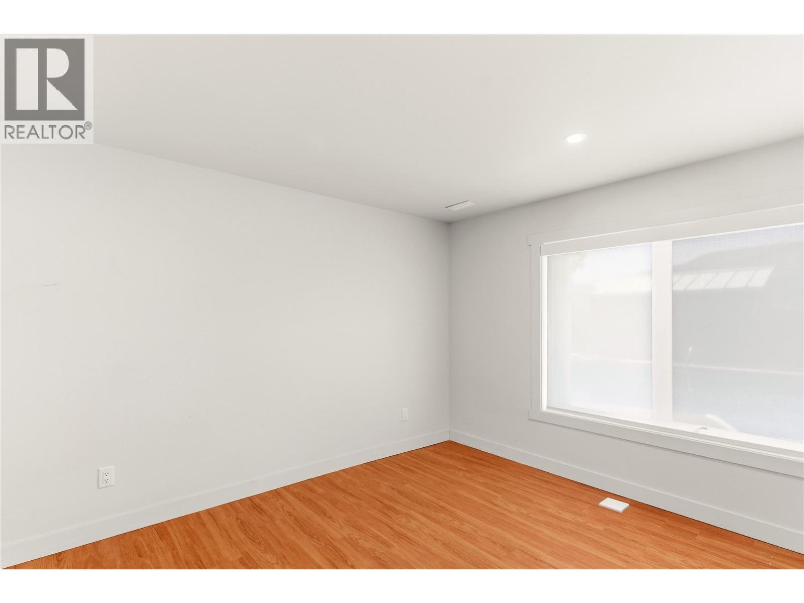 Bedroom 1 on lower level - 2090 Bennett Road, Kelowna, BC - Indoor Photo Showing Other Room