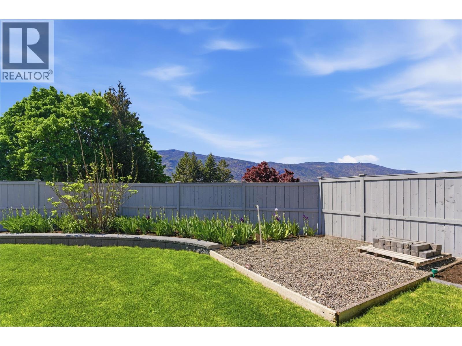 Landscaped and ready for your gardening dreams! - 2090 Bennett Road, Kelowna, BC - Outdoor
