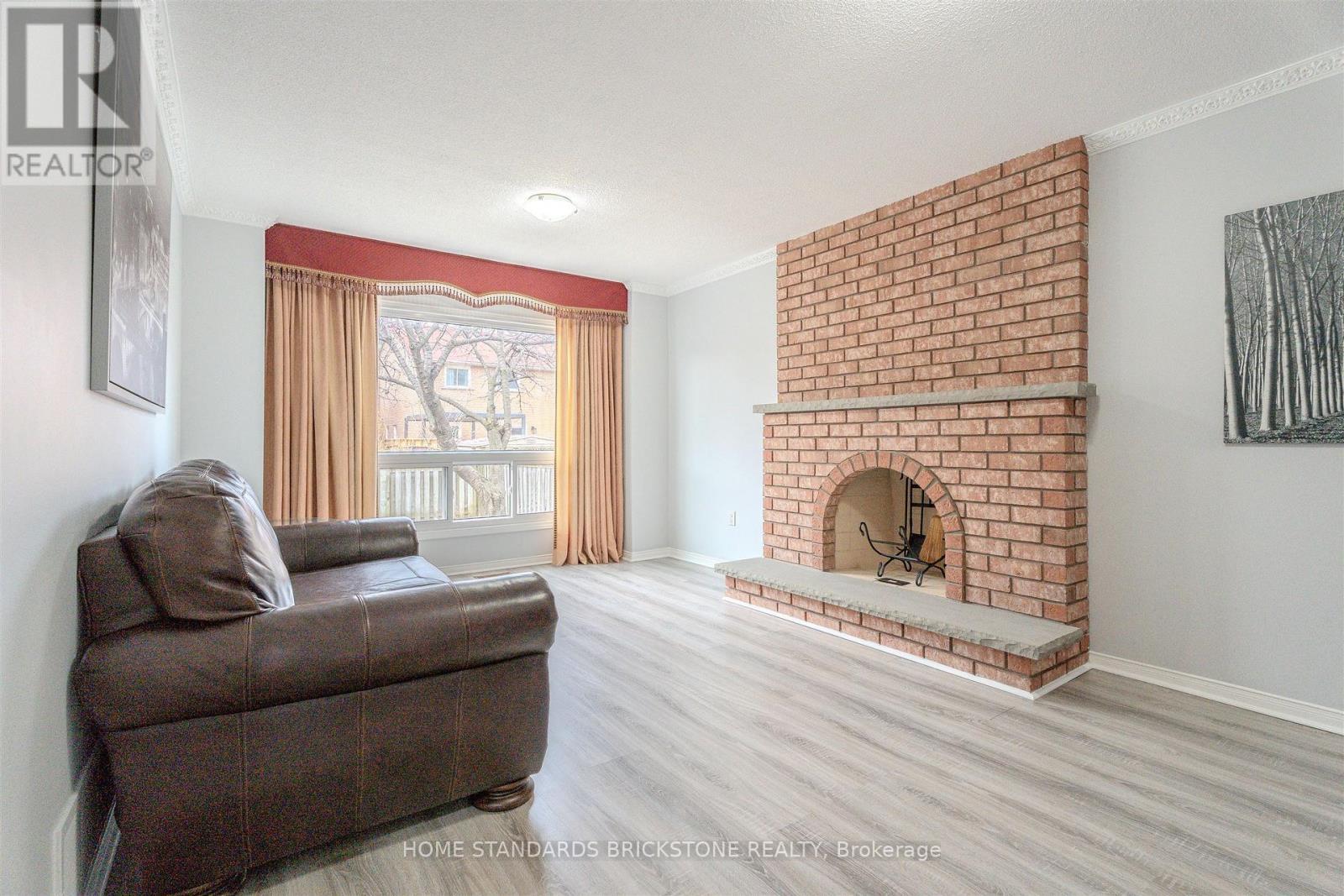 4538 Penhallow Road, Mississauga, ON - Indoor Photo Showing Living Room With Fireplace