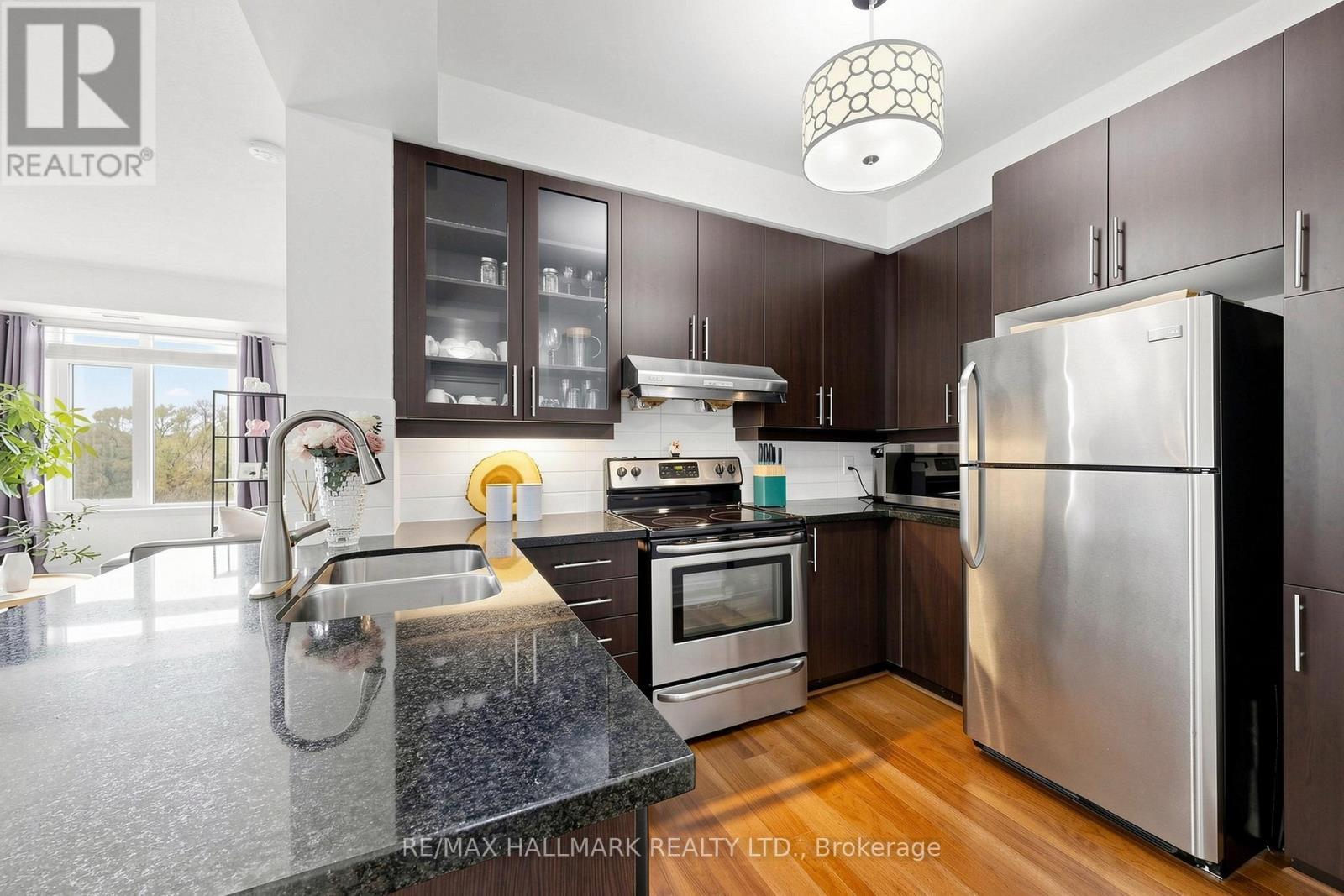 203 - 151 Upper Duke Crescent, Markham, ON - Indoor Photo Showing Kitchen With Stainless Steel Kitchen With Double Sink