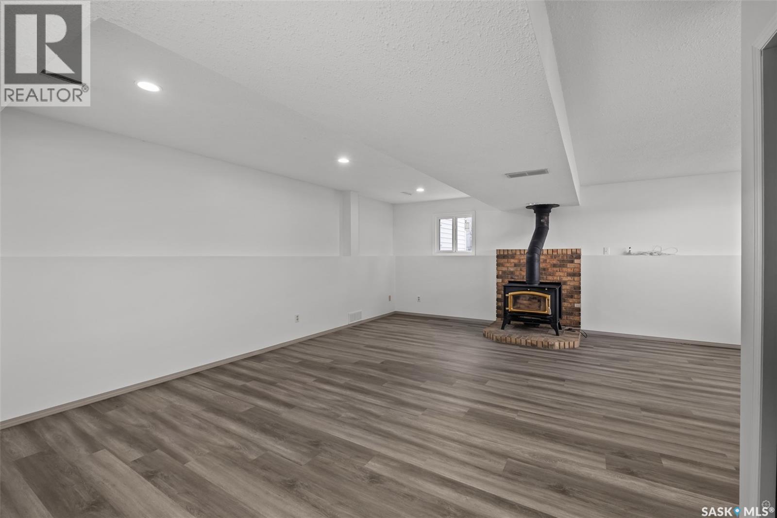 3367 15Th Avenue E, Prince Albert, SK - Indoor Photo Showing Other Room With Fireplace