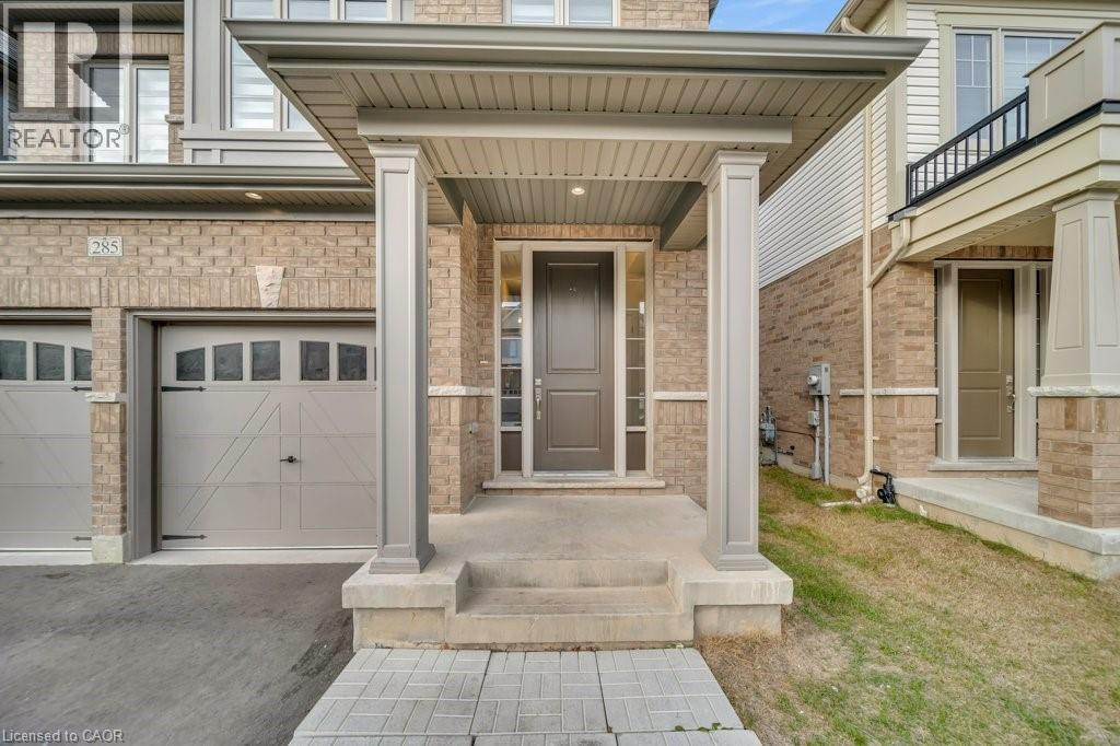 Entrance to property with a garage and brick siding - 285 Broadacre Drive, Kitchener, ON - Outdoor