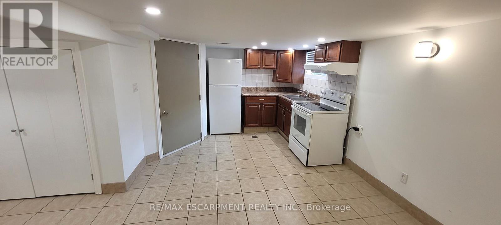 Lower Level - 98 Limeridge Road E, Hamilton, ON - Indoor Photo Showing Kitchen With Double Sink