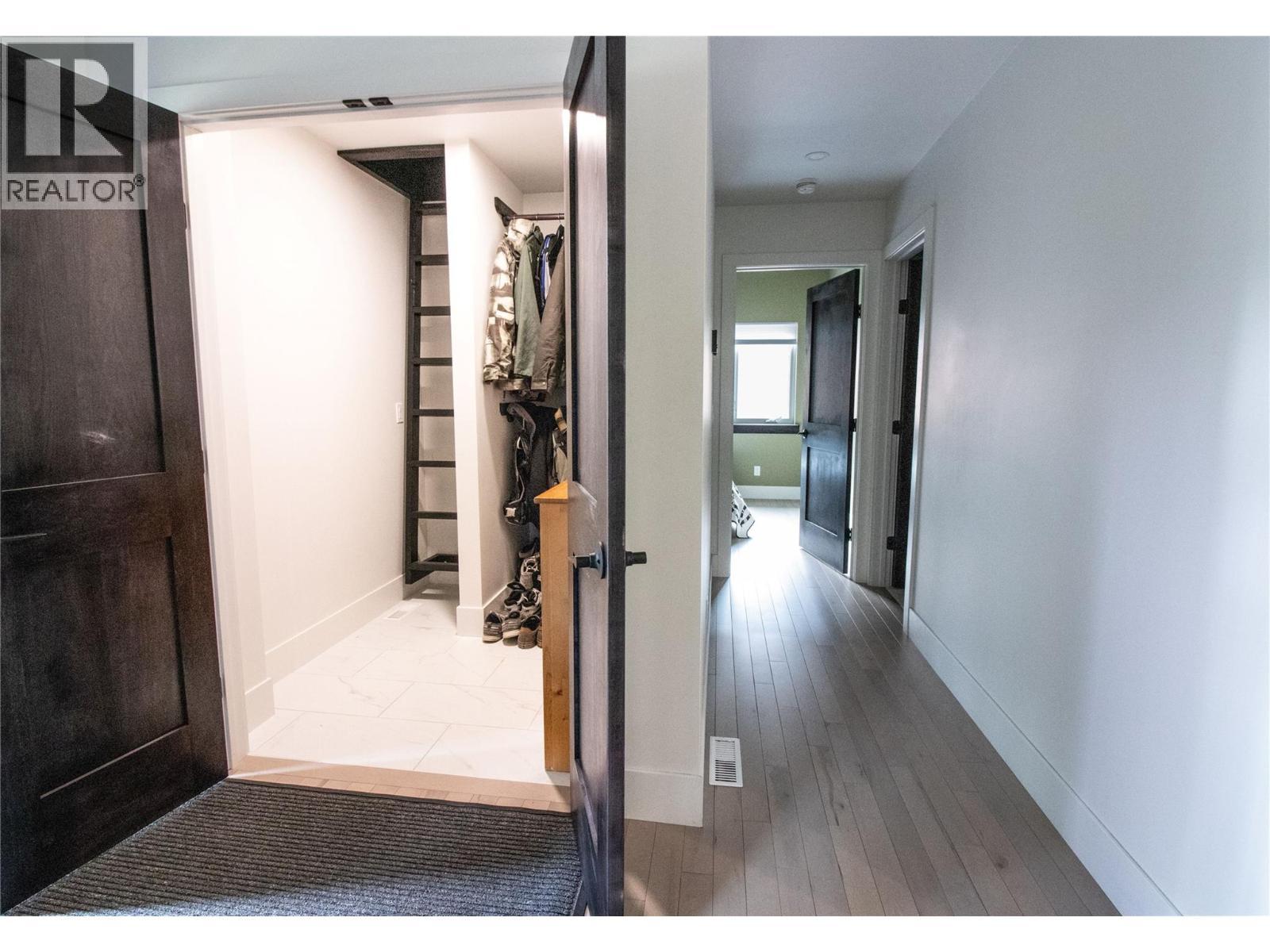 Entry Cupboard with Kids nook/storage up the ladder - 2552 Sandstone Mews, Invermere, BC