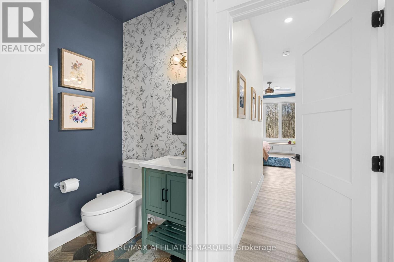 Stylish powder room tucked away - 4421M Old Kingston Road, Rideau Lakes, ON