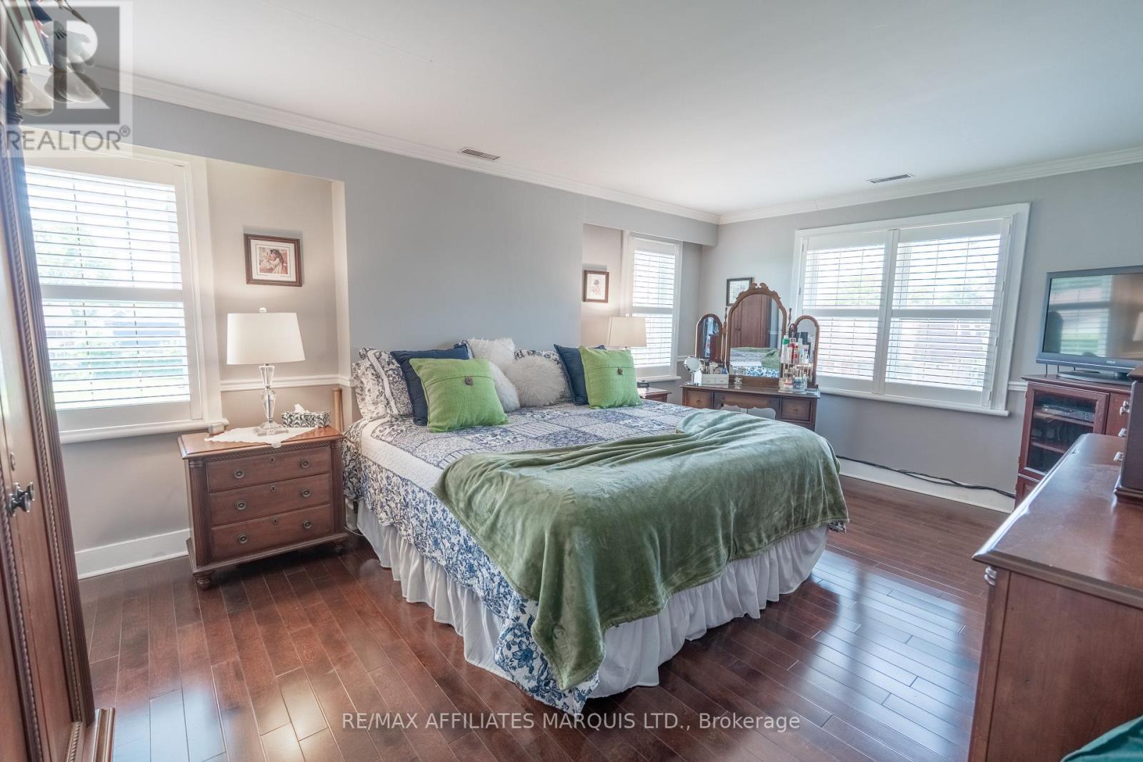 Primary with 3 windows and 2 walk-in closets - 420 Third Street W, Cornwall, ON - Indoor Photo Showing Bedroom