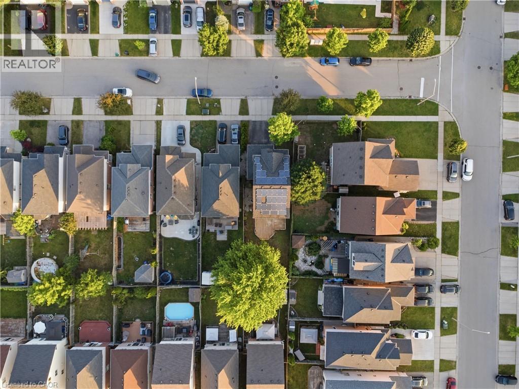Aerial perspective showcasing residential properties with established landscaping - 128 Houghton Street, Cambridge, ON