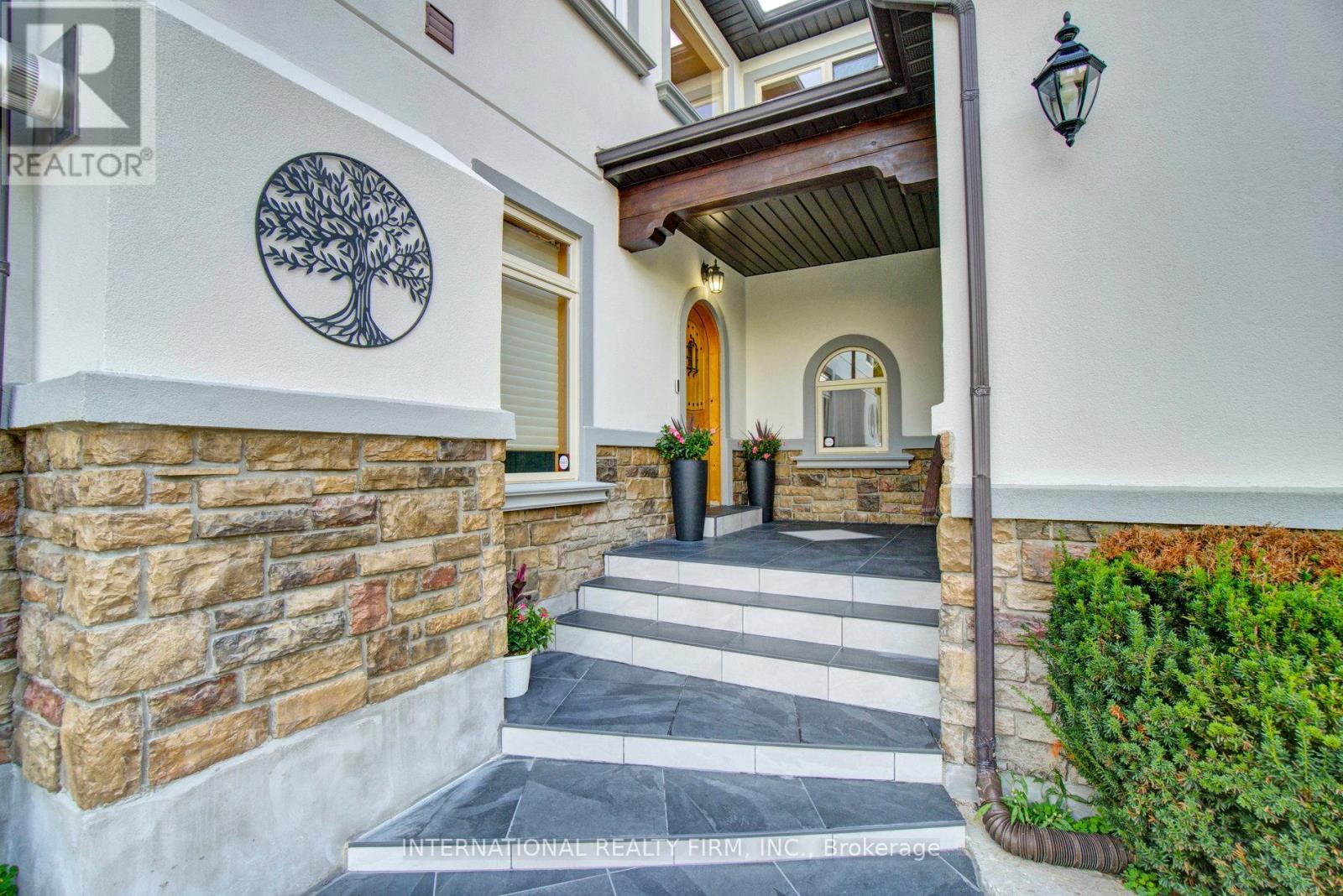 Welcoming front porch steps to main entrance. - 6 Pinehurst Lane, Springwater, ON - Outdoor