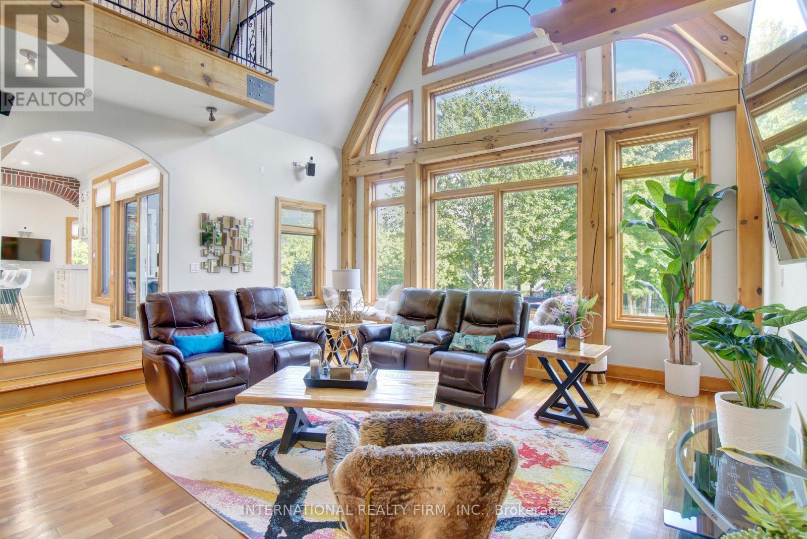 Breathtaking Great Room with cathedral ceilings. - 6 Pinehurst Lane, Springwater, ON - Indoor Photo Showing Living Room