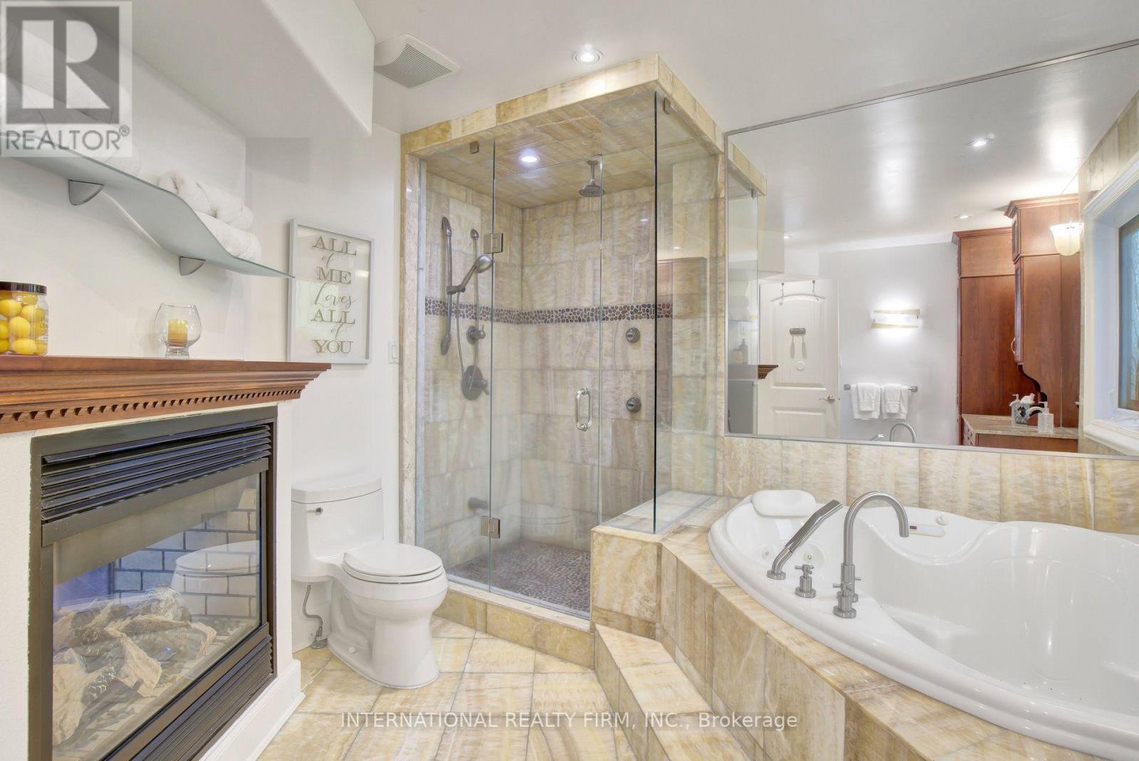 Spa-style 7-piece ensuite with heated floors. - 6 Pinehurst Lane, Springwater, ON - Indoor Photo Showing Bathroom