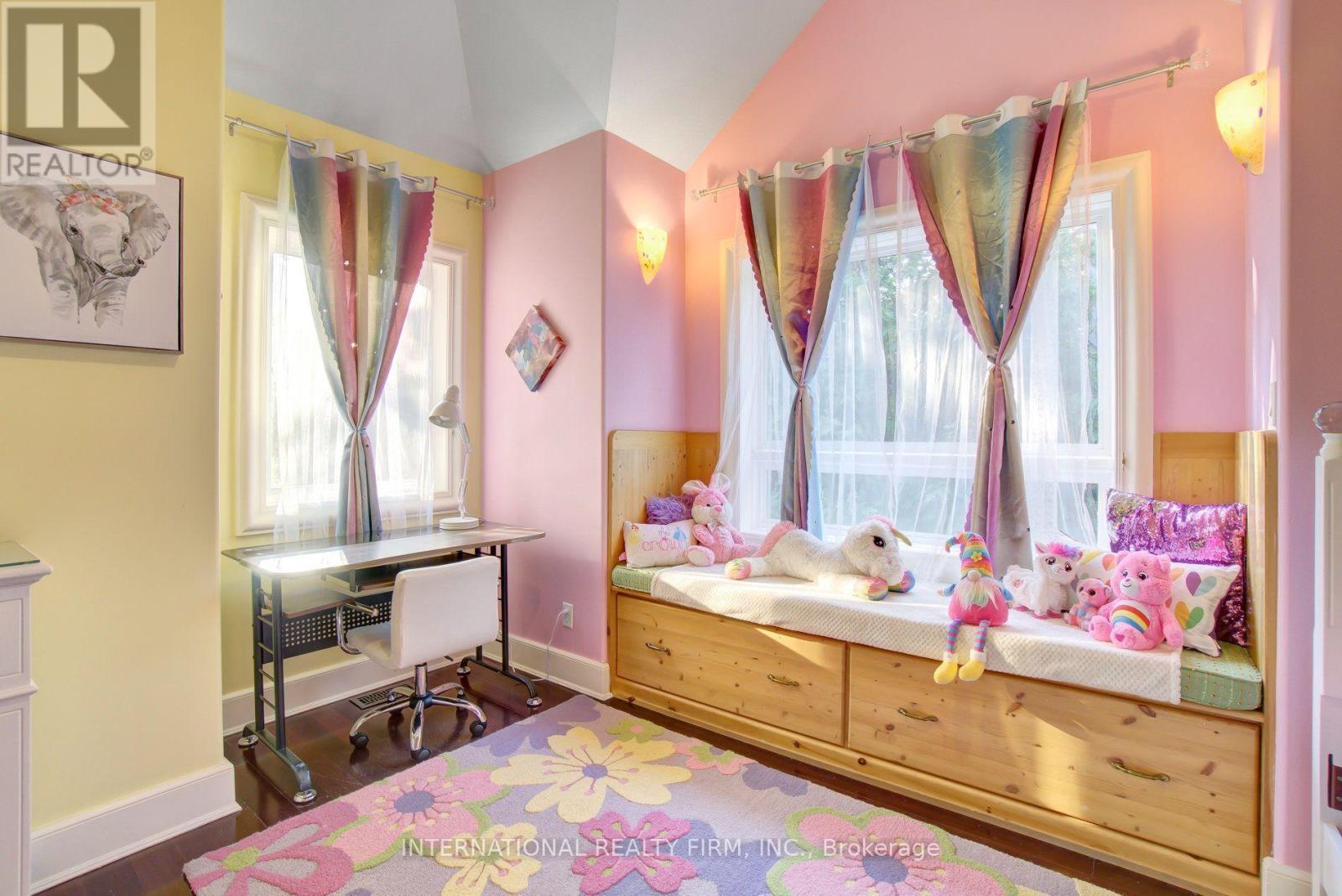 Ample rooms with custom benches and large windows. - 6 Pinehurst Lane, Springwater, ON - Indoor Photo Showing Bathroom