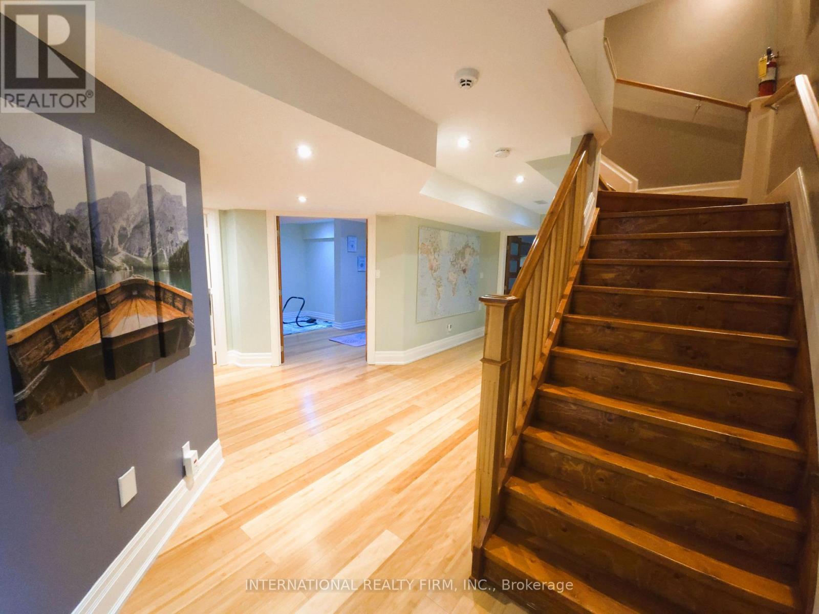 Massive lower level rec room with bamboo floors. - 6 Pinehurst Lane, Springwater, ON - Indoor Photo Showing Other Room