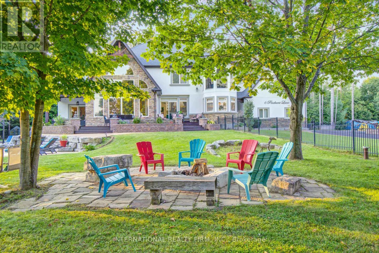 Fire pit area perfect for relaxing & entertaining. - 6 Pinehurst Lane, Springwater, ON - Outdoor