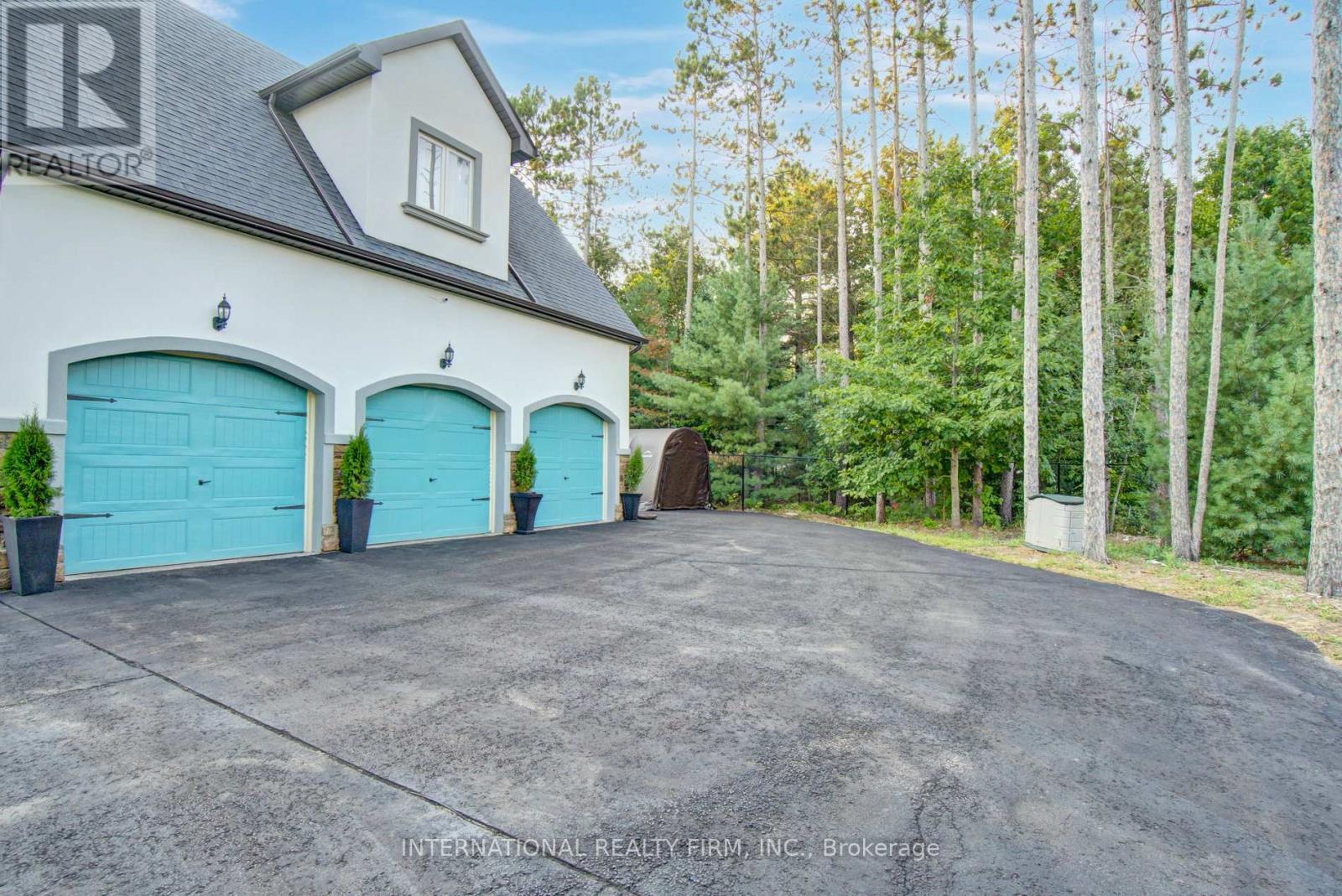 Attached 3-car garage with soaring 14-ft ceilings. - 6 Pinehurst Lane, Springwater, ON - Outdoor