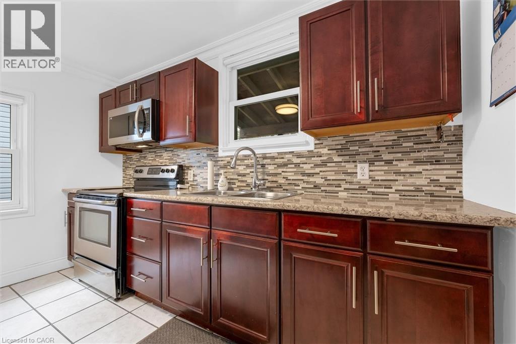 722 Burgess Avenue, Hamilton, ON - Indoor Photo Showing Kitchen With Double Sink
