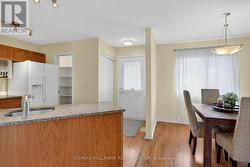 Kitchen and adjacent dining room. -