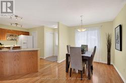 Kitchen and adjacent dining room. -