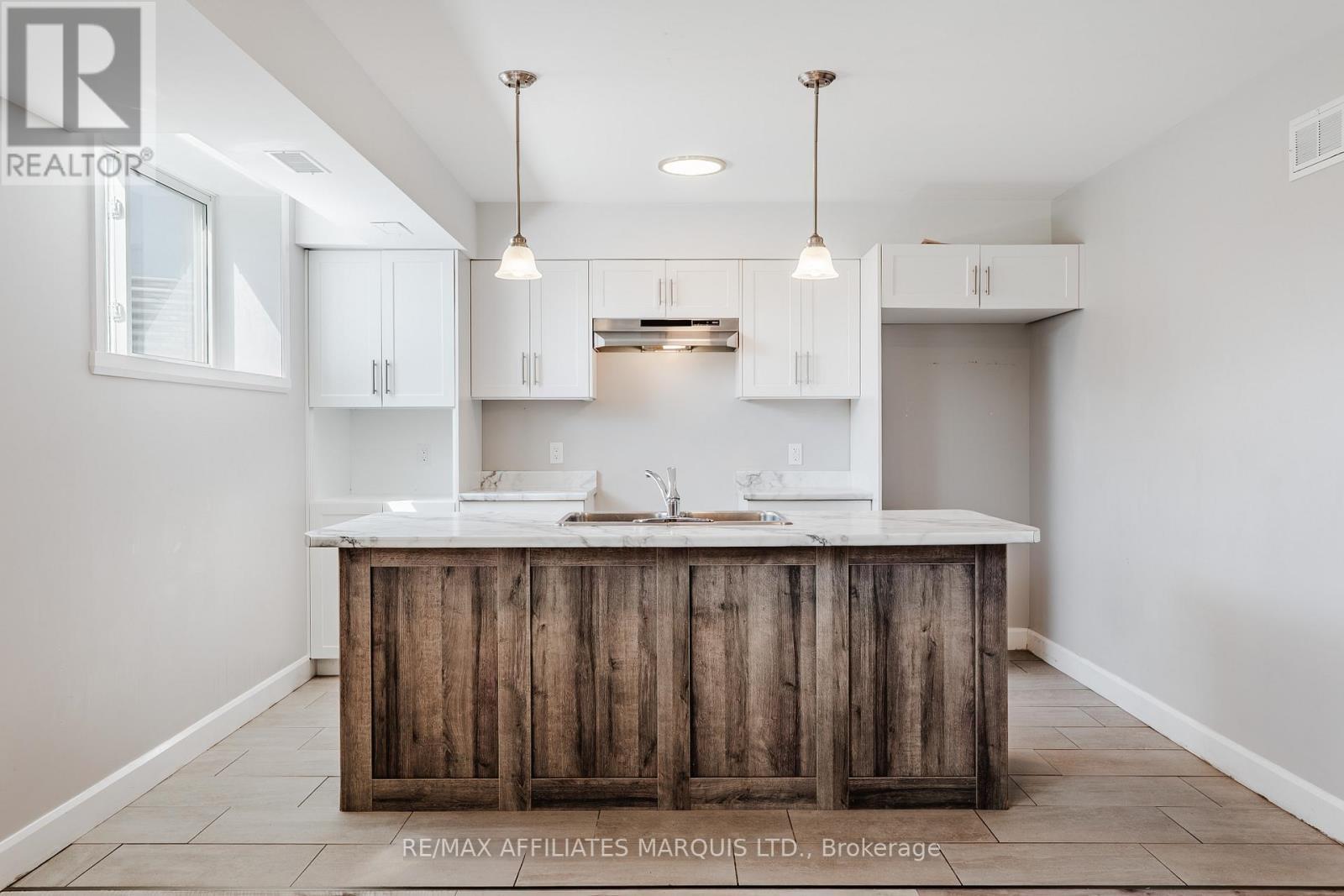 Photo is of lower unit - 2459 Watson Crescent, Cornwall, ON
