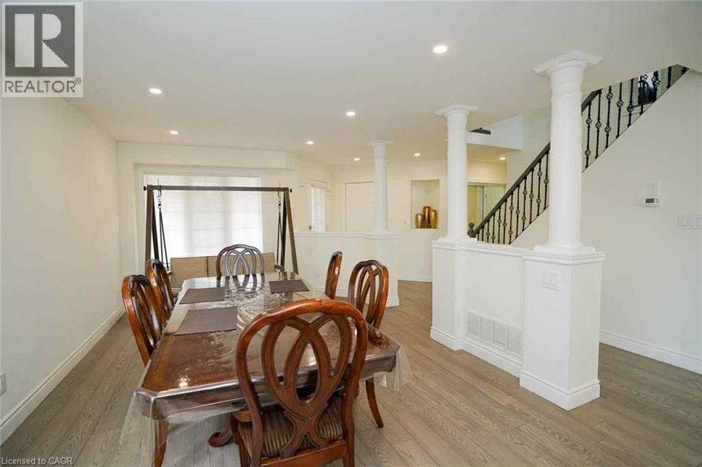 Open concept room with recessed lighting and light wood-finish flooring - 187 Adler Drive, Cambridge, ON - Indoor Photo Showing Dining Room