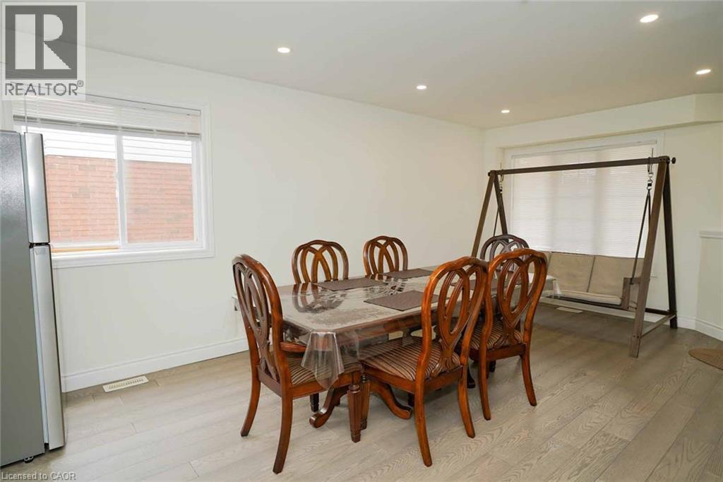 Open concept room featuring recessed lighting, light wood-finish flooring, and white walls - 187 Adler Drive, Cambridge, ON - Indoor Photo Showing Dining Room