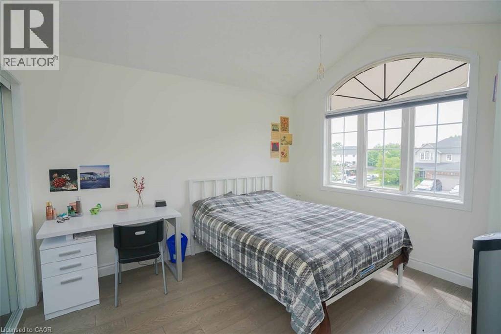 Vaulted ceiling room featuring wood-finish flooring - 187 Adler Drive, Cambridge, ON - Indoor Photo Showing Bedroom