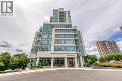 Modern high-rise building with a tiered architectural design - 