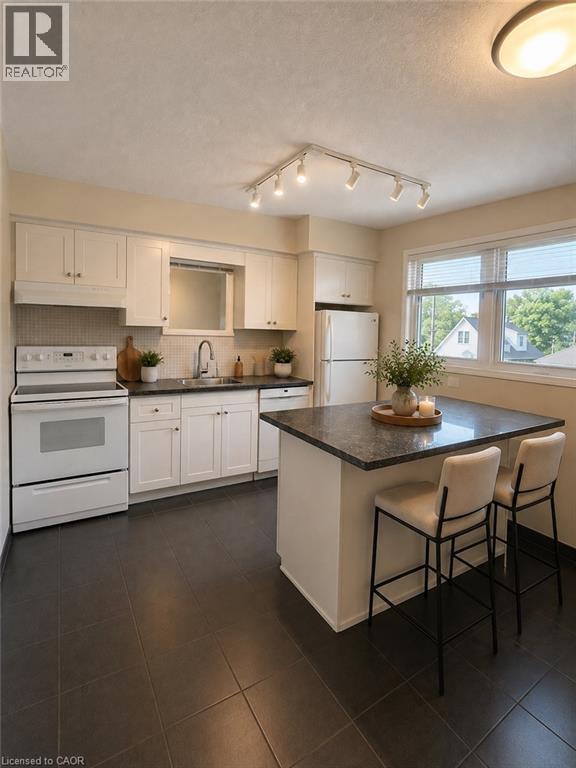 Virtually Staged - 80 Maclennan Avenue, Hamilton, ON - Indoor Photo Showing Kitchen