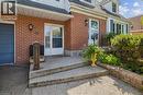 Brick exterior with white siding accents and a black shingle roof - 80 Maclennan Avenue, Hamilton, ON  - Outdoor With Exterior 