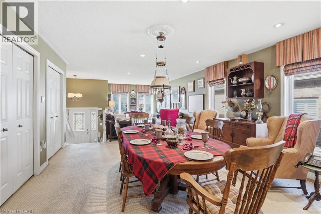 9 Pace Avenue, Brantford, ON - Indoor Photo Showing Dining Room With Fireplace