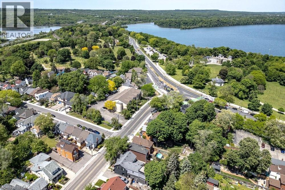 Aerial perspective showcasing a residential area with varied housing styles - 148 Dundurn Street N, Hamilton, ON