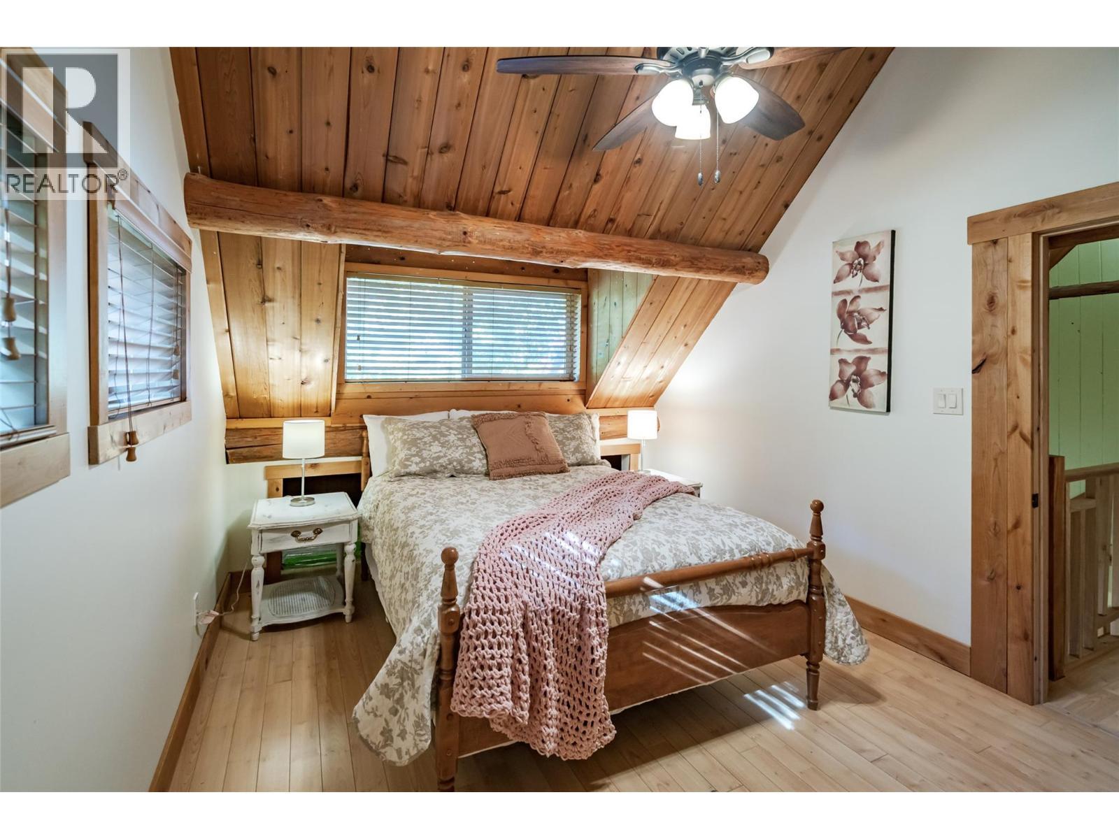 8840 Olson Road, Kaslo, BC - Indoor Photo Showing Bedroom