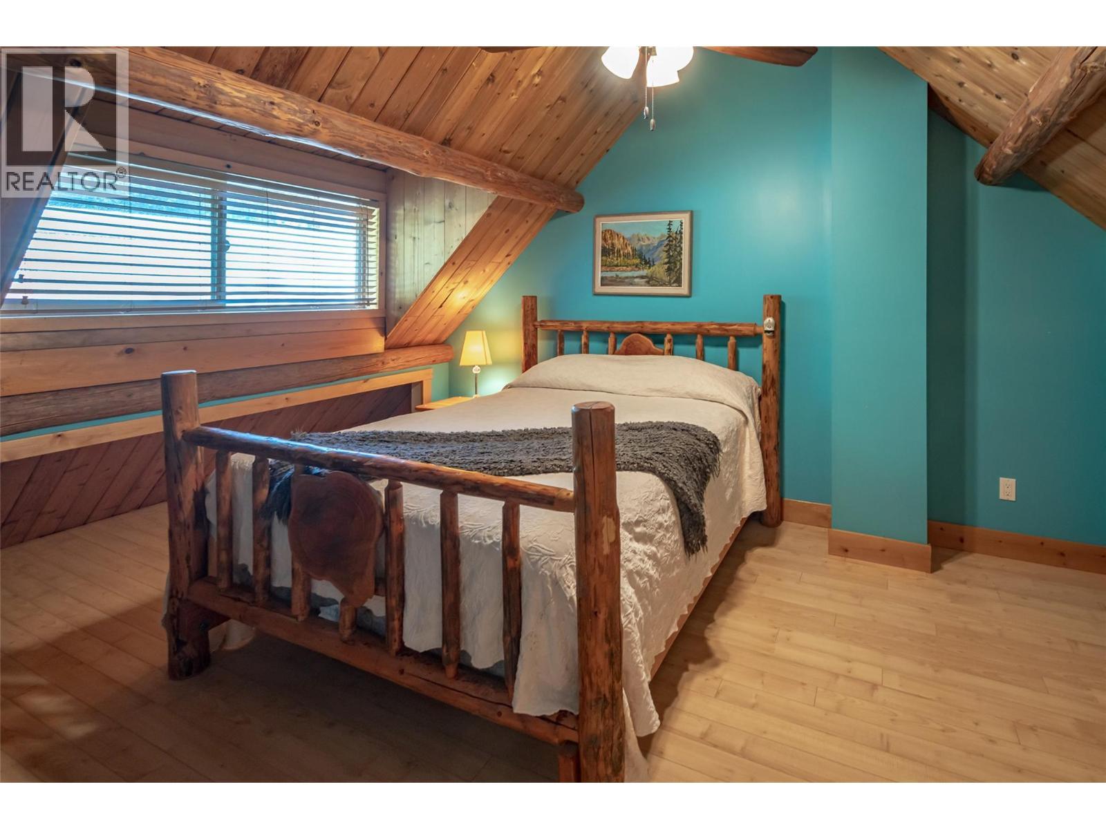 8840 Olson Road, Kaslo, BC - Indoor Photo Showing Bedroom