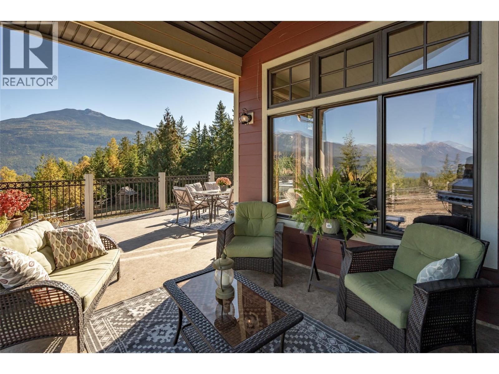 8840 Olson Road, Kaslo, BC - Outdoor With Deck Patio Veranda With Exterior
