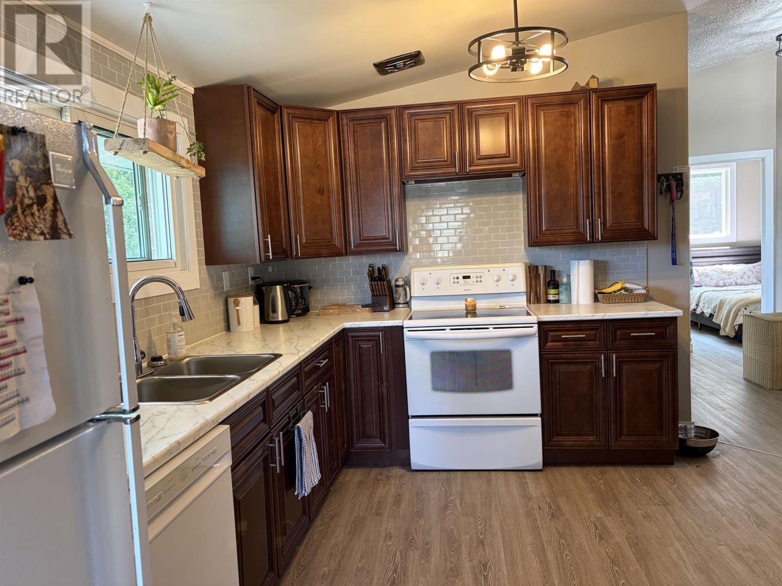 77 Hillside Dr S, Elliot Lake, ON - Indoor Photo Showing Kitchen With Double Sink