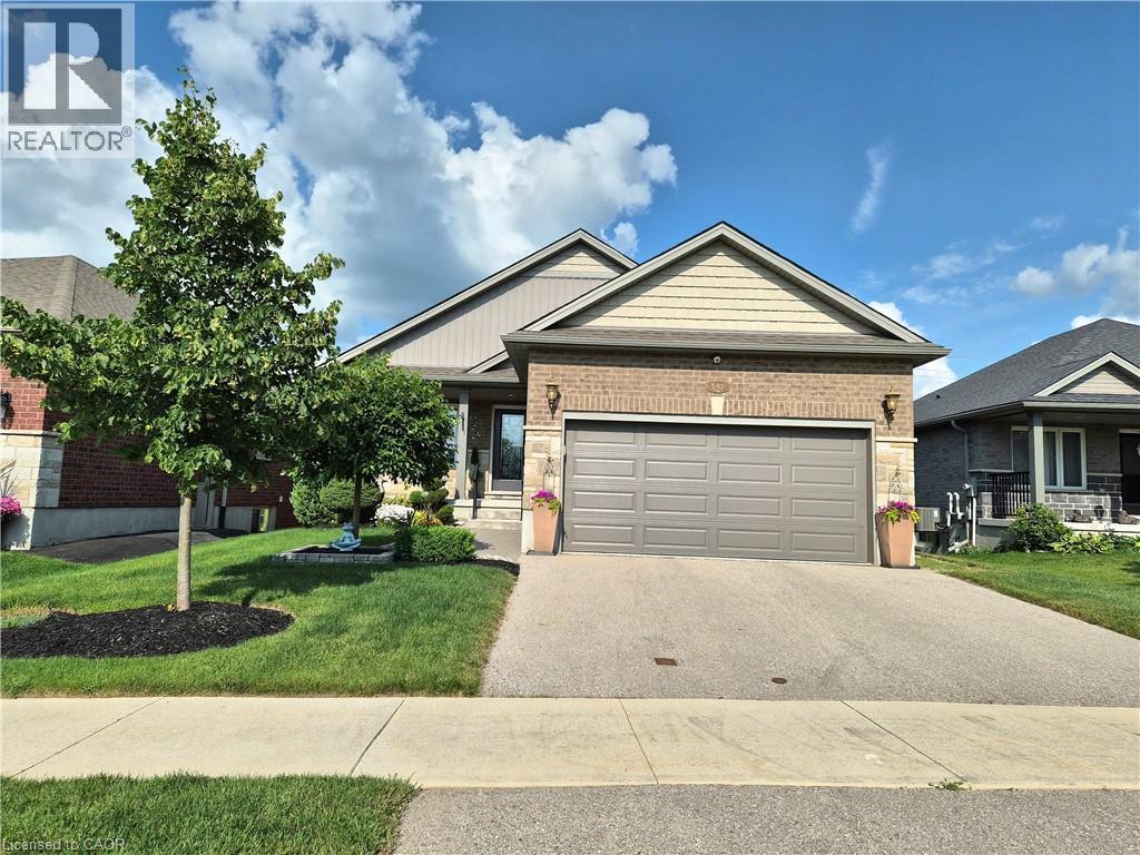 130 Bridge Crescent, Minto, ON - Outdoor With Facade