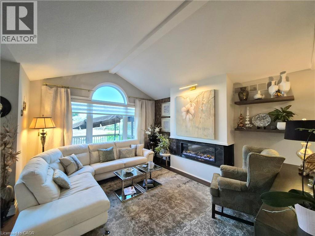 130 Bridge Crescent, Minto, ON - Indoor Photo Showing Living Room With Fireplace