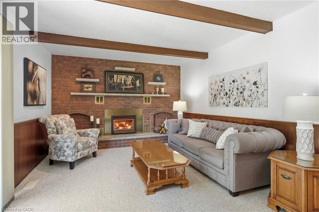 11 Tanera Crescent, St. Catharines, ON - Indoor Photo Showing Living Room With Fireplace