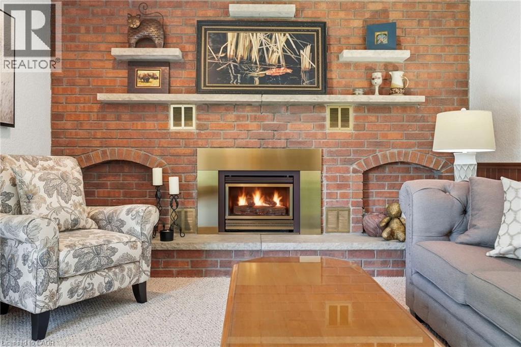 11 Tanera Crescent, St. Catharines, ON - Indoor Photo Showing Living Room With Fireplace